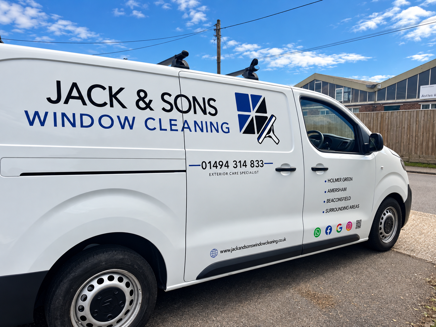 Branded Jack & Sons Window Cleaning van serving Holmer Green, Amersham and Beaconsfield, showing services and phone number 01494 314 833